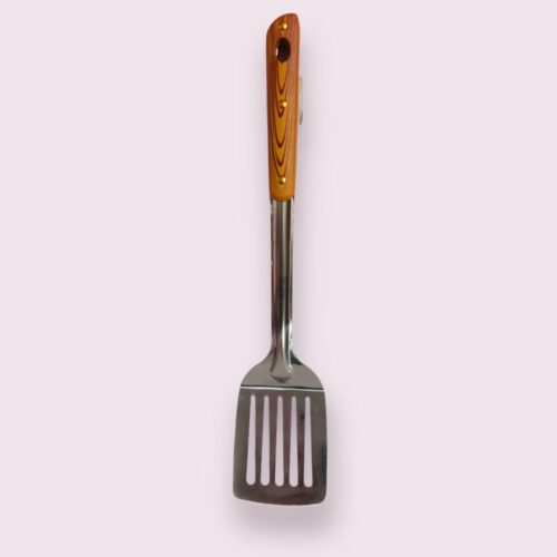 Spatule dorée à trois trous
