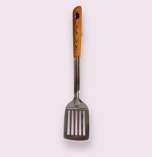 Spatule dorée à trois trous